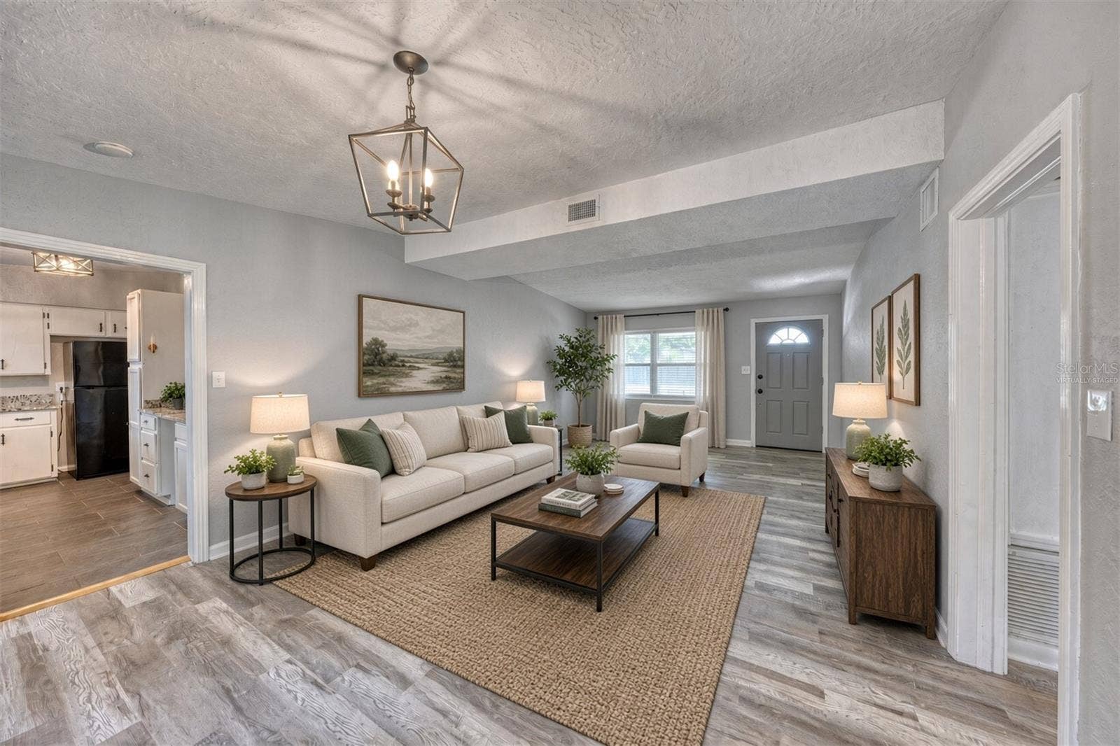 1712 EDMUNDSHIRE ROAD, Orlando, FL 32812 Virtually Staged. Great Room.