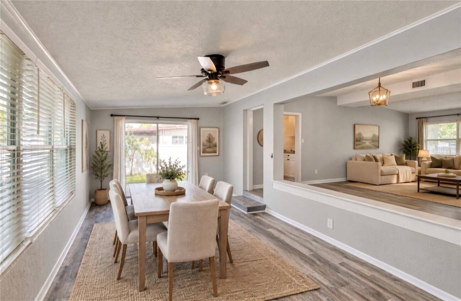 1712 EDMUNDSHIRE ROAD, Orlando, FL 32812 Virtually Staged. Family Room.