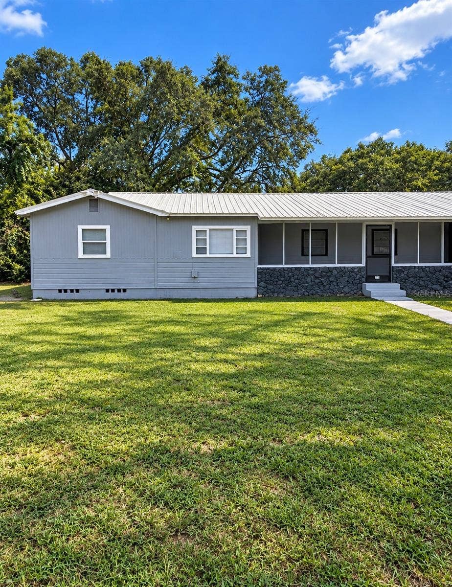 1618 MAGNOLIA AVENUE, Deland, FL 32724 Front Side 2