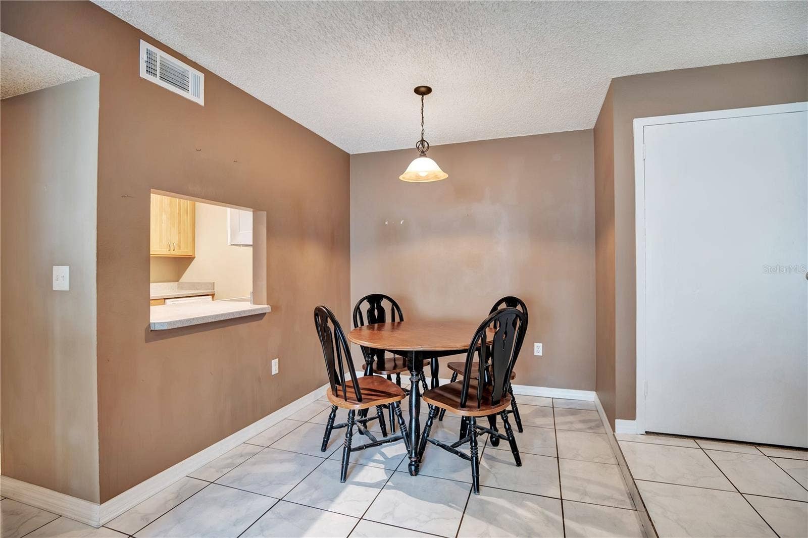 3278 S SEMORAN BOULEVARD, #12, Orlando, FL 32822 Dining Area Staged