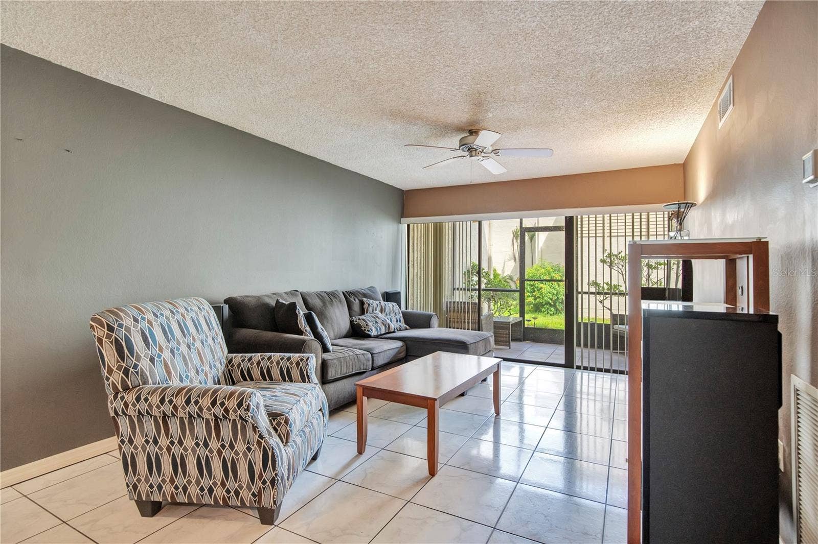 3278 S SEMORAN BOULEVARD, #12, Orlando, FL 32822 Living Room Staged
