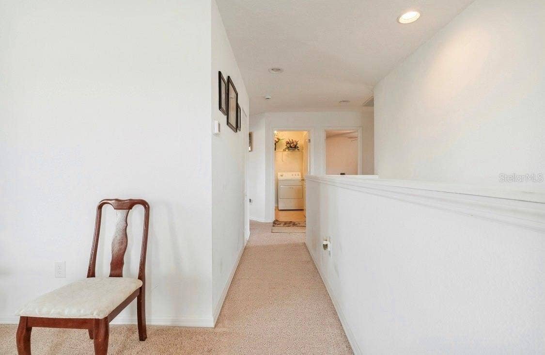 10781 CABBAGE TREE LOOP, Orlando, FL 32825 Hallway to Bedrooms