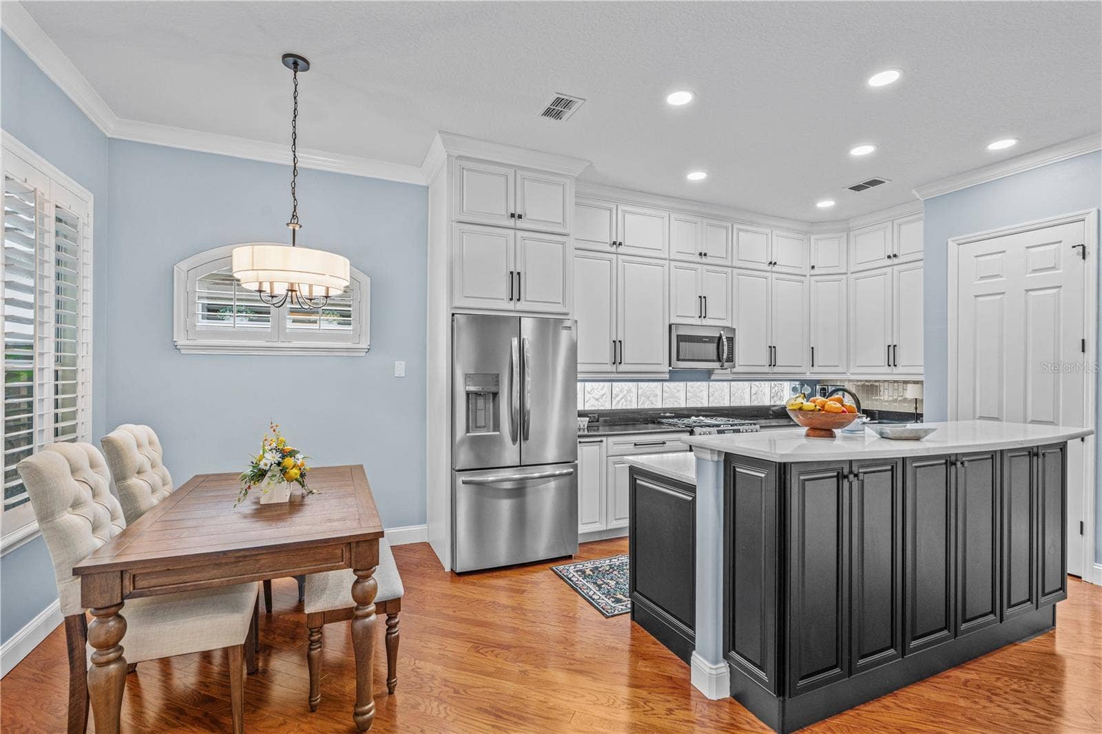 520 SOTHEBY WAY, Debary, FL 32713 The renovated kitchen offers tons of storage-- there are even cabinets under the breakfast bar!