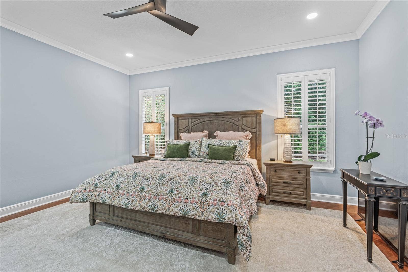 520 SOTHEBY WAY, Debary, FL 32713 The primary bedroom windows overlook the back yard-- which is very private due to mature landscaping and trees
