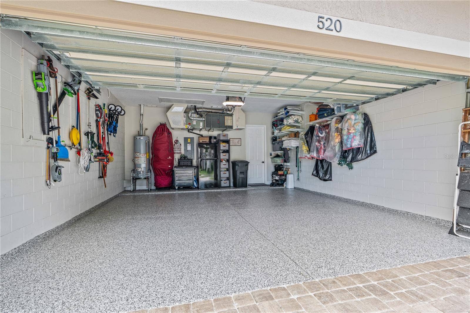 520 SOTHEBY WAY, Debary, FL 32713 Epoxy-coated garage floor is immaculate; The "myQ" wifi-enabled garage door opener & entry pad with integrated camera (not shown in this picture) convey