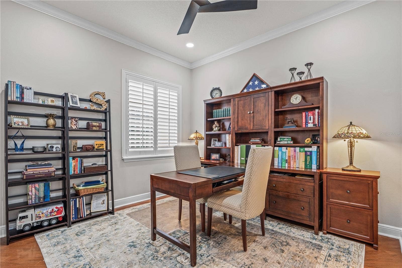 520 SOTHEBY WAY, Debary, FL 32713 Bedroom 2 currently used as an office with hardwood floors, updated ceiling fan and can lights installed in the ceiling for extra light