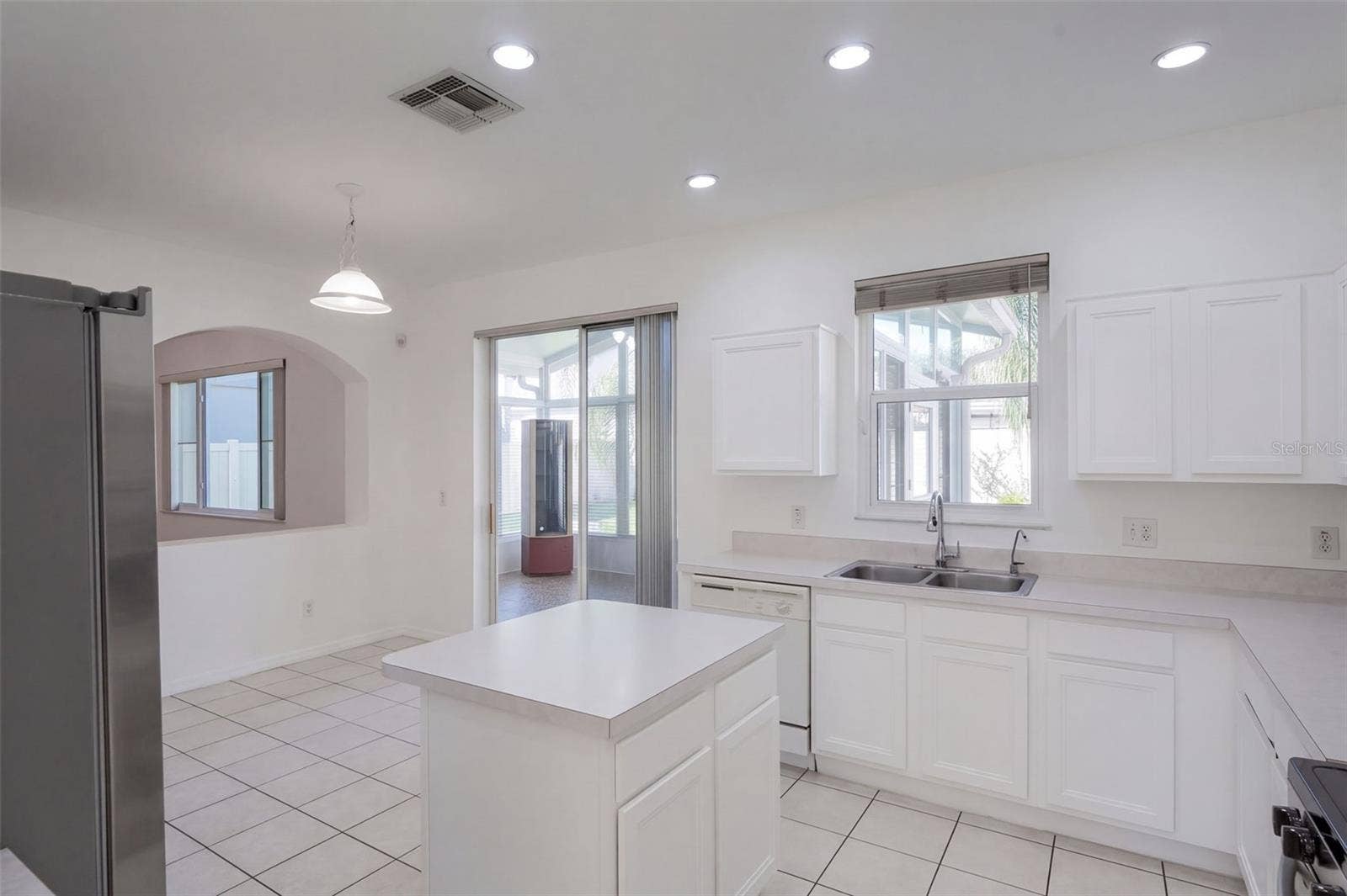 4610 RIVERTON DRIVE, Orlando, FL 32817 Kitchen view, looking toward lanai