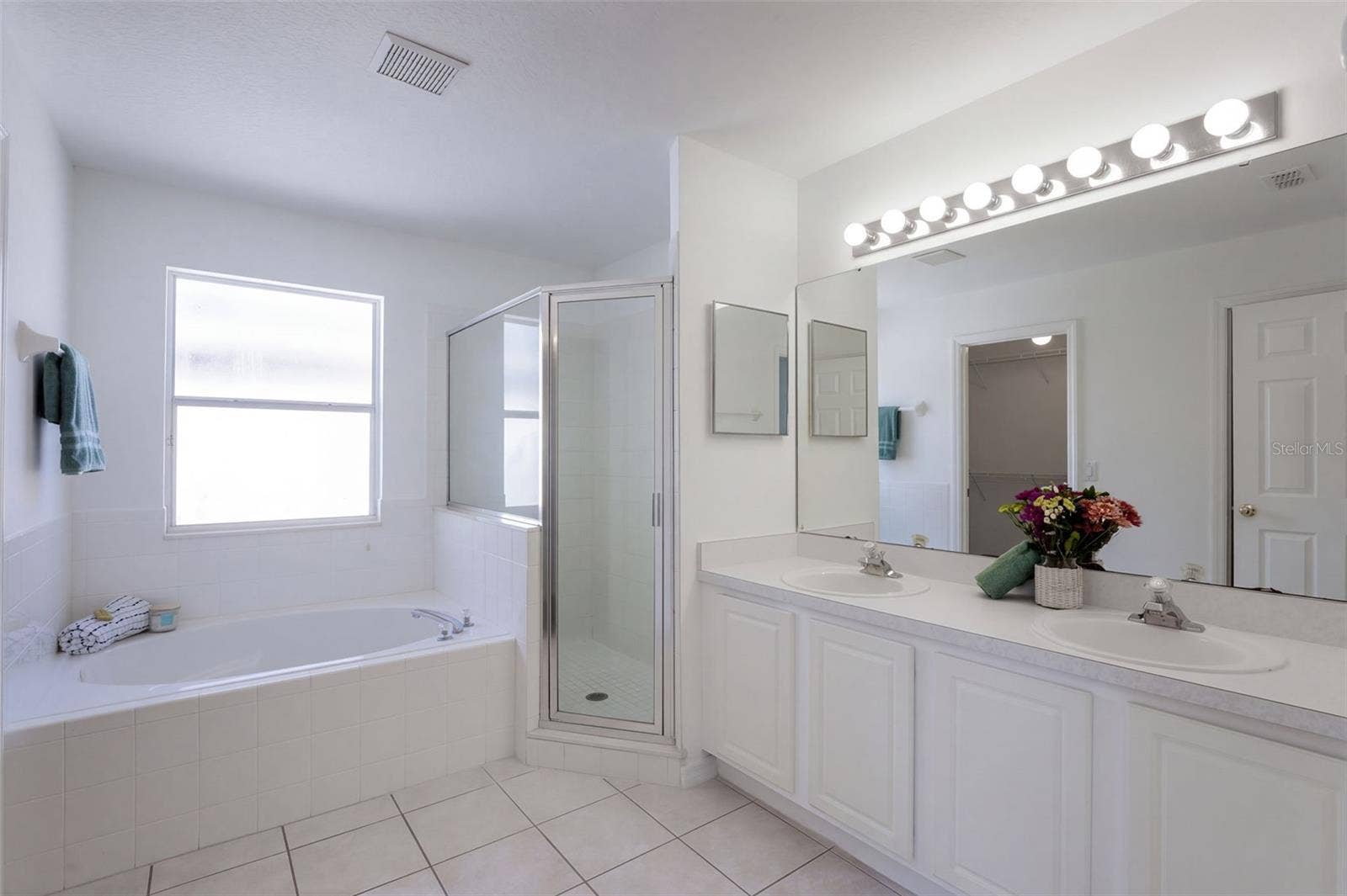 4610 RIVERTON DRIVE, Orlando, FL 32817 En suite bath with tub and separate shower, dual sinks