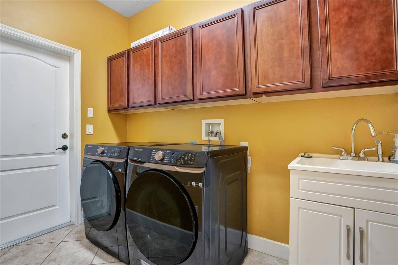 5762 COVINGTON COVE WAY, Orlando, FL 32829 laundry room