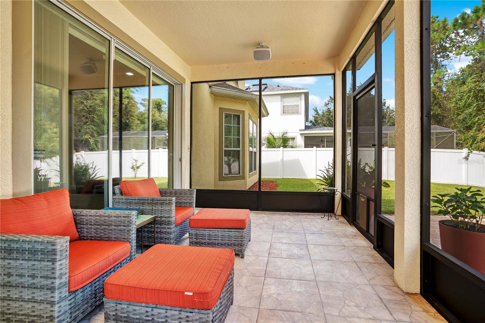 5762 COVINGTON COVE WAY, Orlando, FL 32829 screened & covered patio