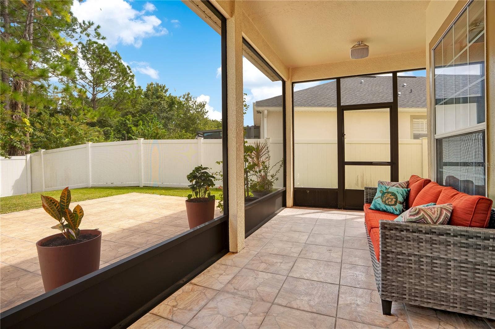 5762 COVINGTON COVE WAY, Orlando, FL 32829 screened & covered patio