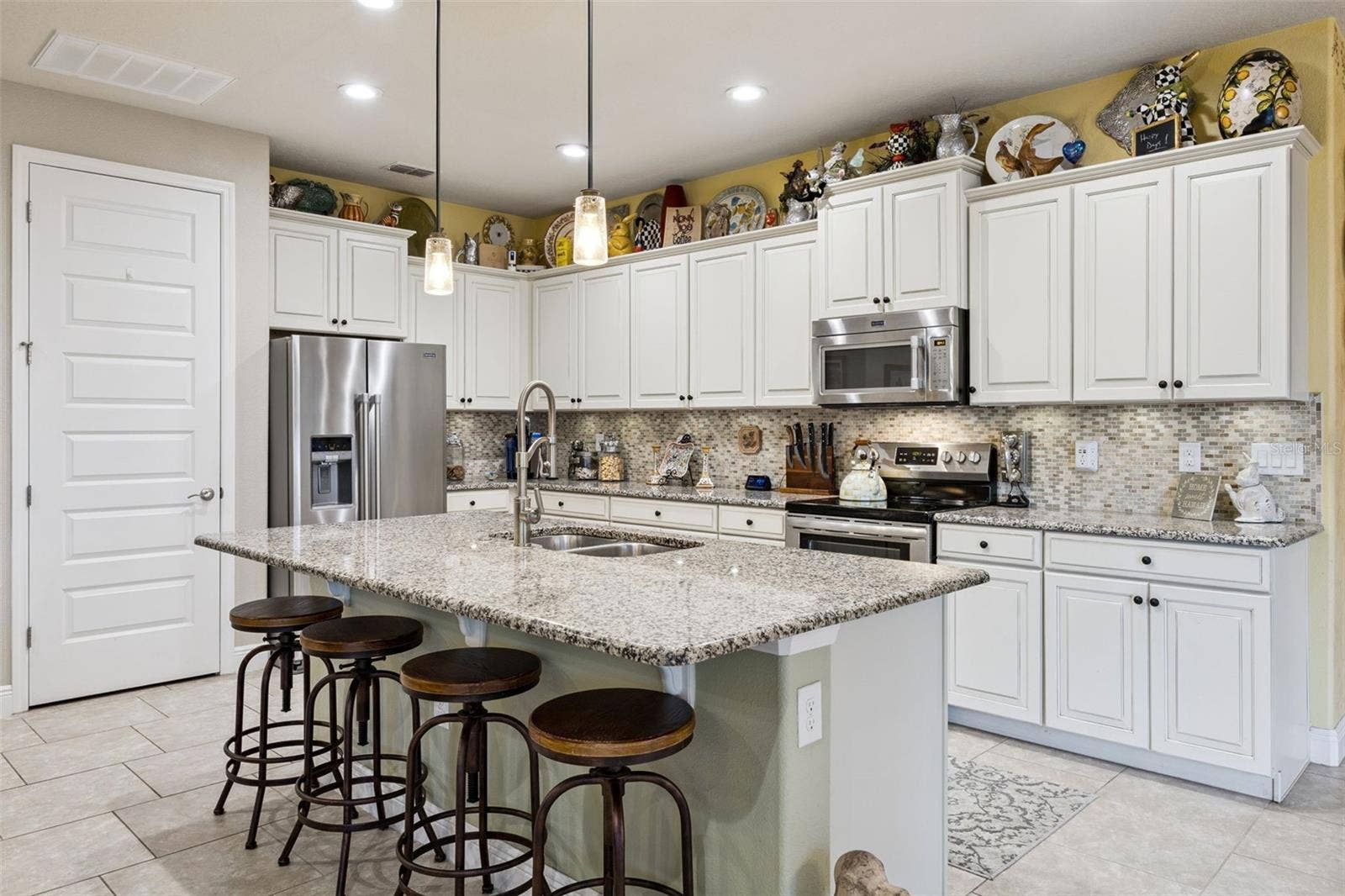Upgraded Kitchen with Glazed Cabinetry and Large Island!