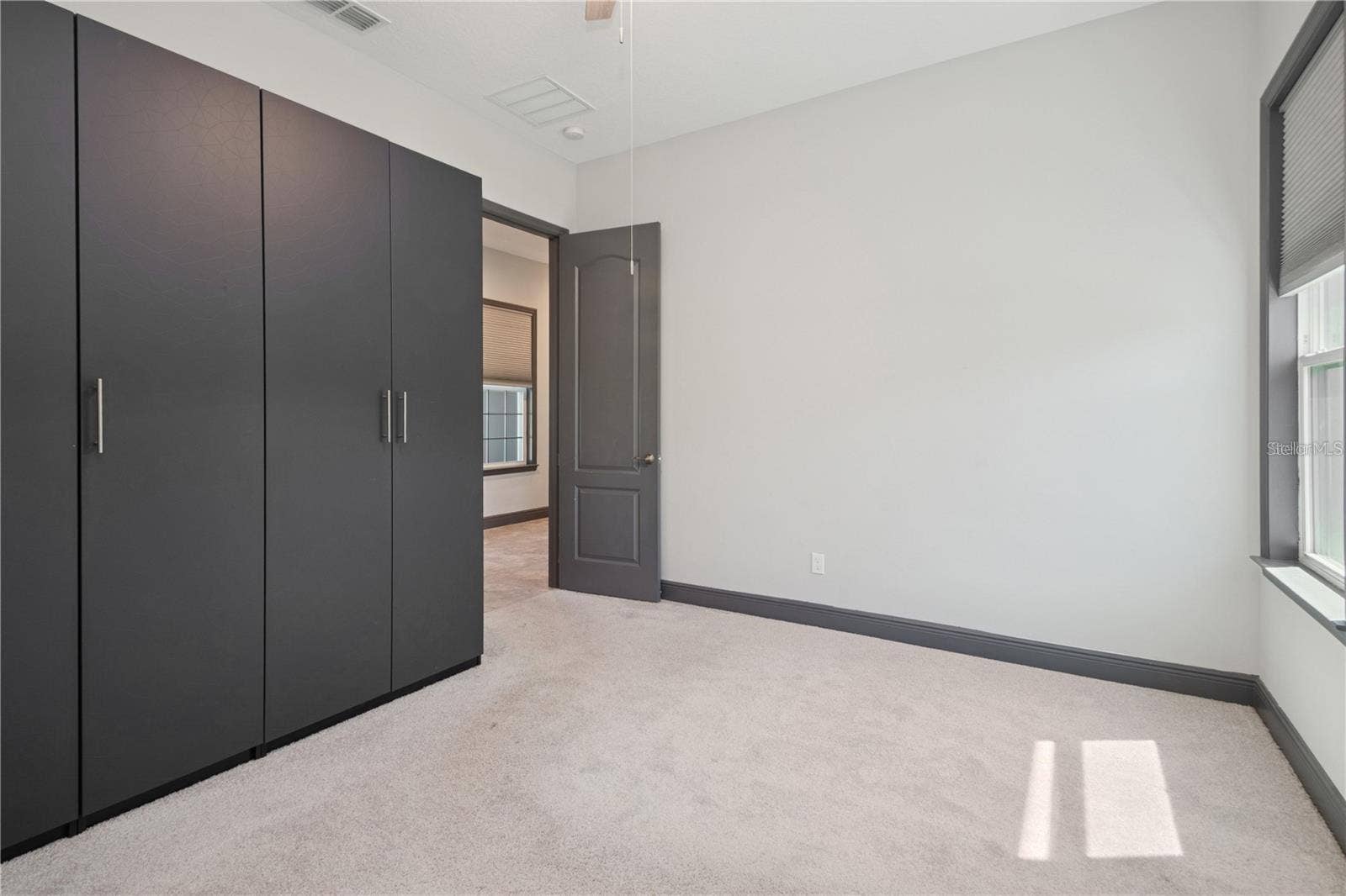 7031 BILLIE COURT, Winter Garden, FL 34787 Ensuite bedroom