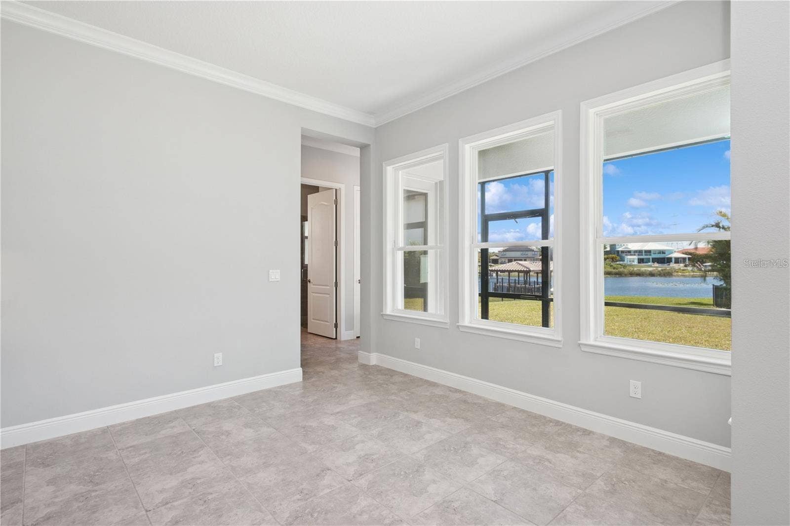 7031 BILLIE COURT, Winter Garden, FL 34787 View from dinette area features lake view