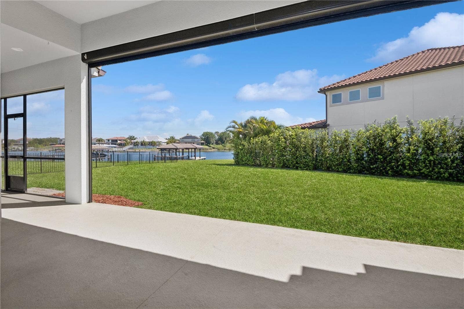 7031 BILLIE COURT, Winter Garden, FL 34787 Patio has retractable screen