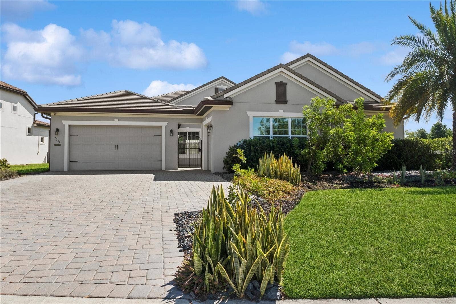 7031 BILLIE COURT, Winter Garden, FL 34787 Single story with courtyard entry