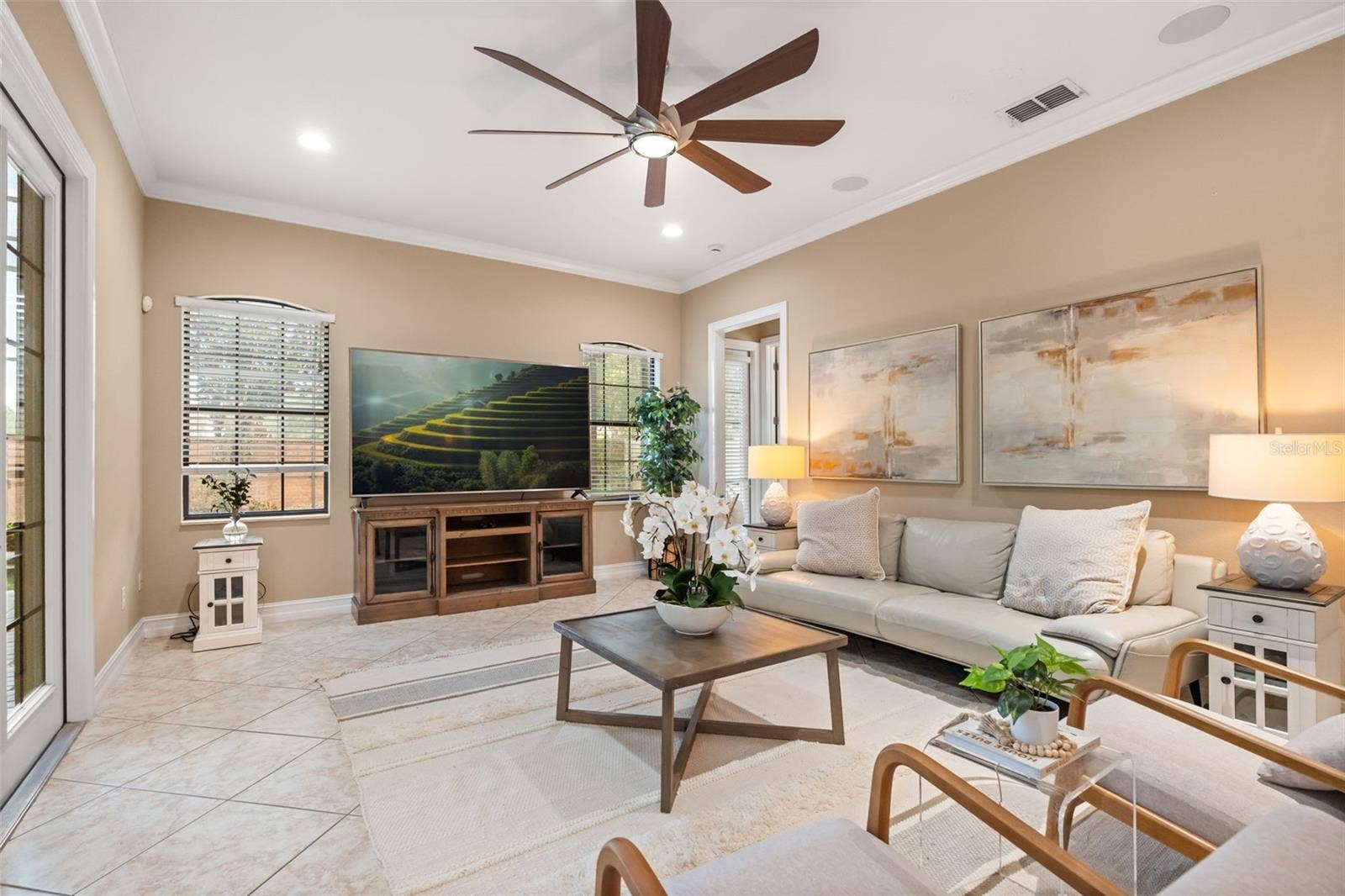 1260 BELLA VISTA CIRCLE, Longwood, FL 32779 Family room leading to back downstairs guest bedroom and bathroom