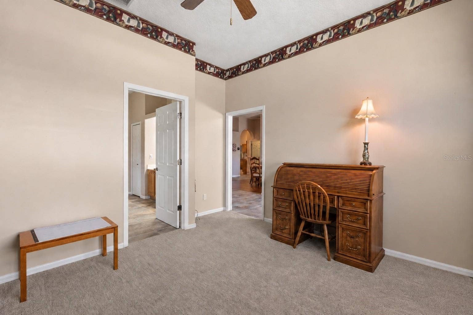 Bonus room, currently serving as office, attached to primary suite