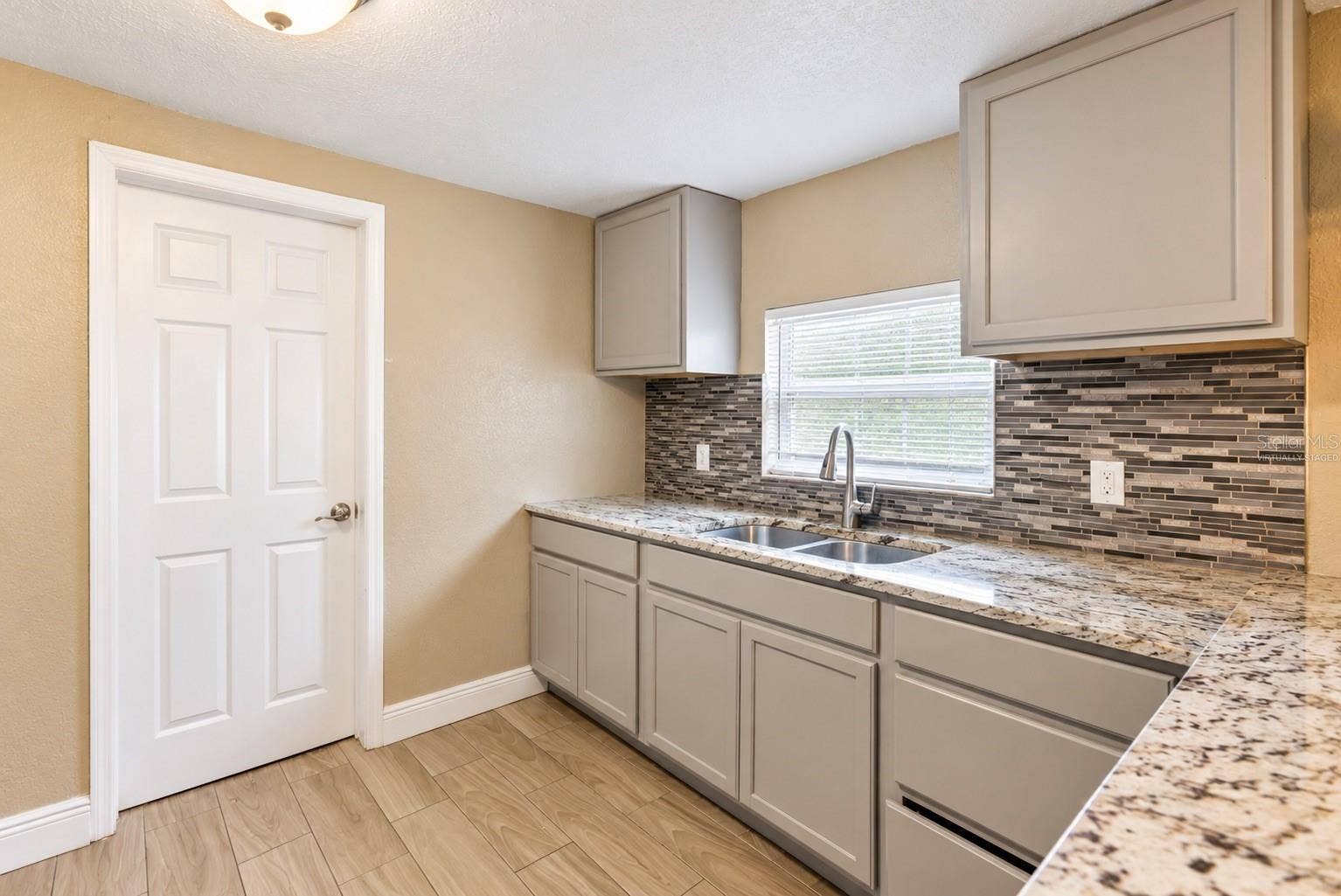 1307 W KALEY AVENUE, Orlando, FL 32805 Virtually Staged Empty