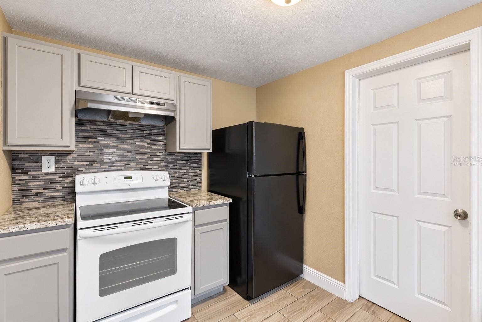 1307 W KALEY AVENUE, Orlando, FL 32805 Virtually Staged Empty