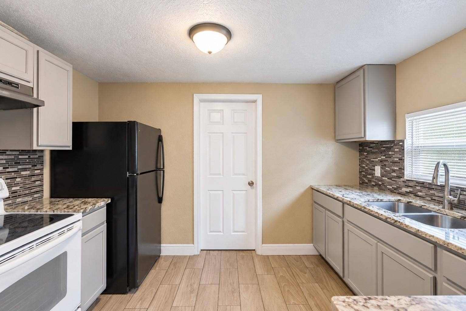 1307 W KALEY AVENUE, Orlando, FL 32805 Virtually Staged Empty