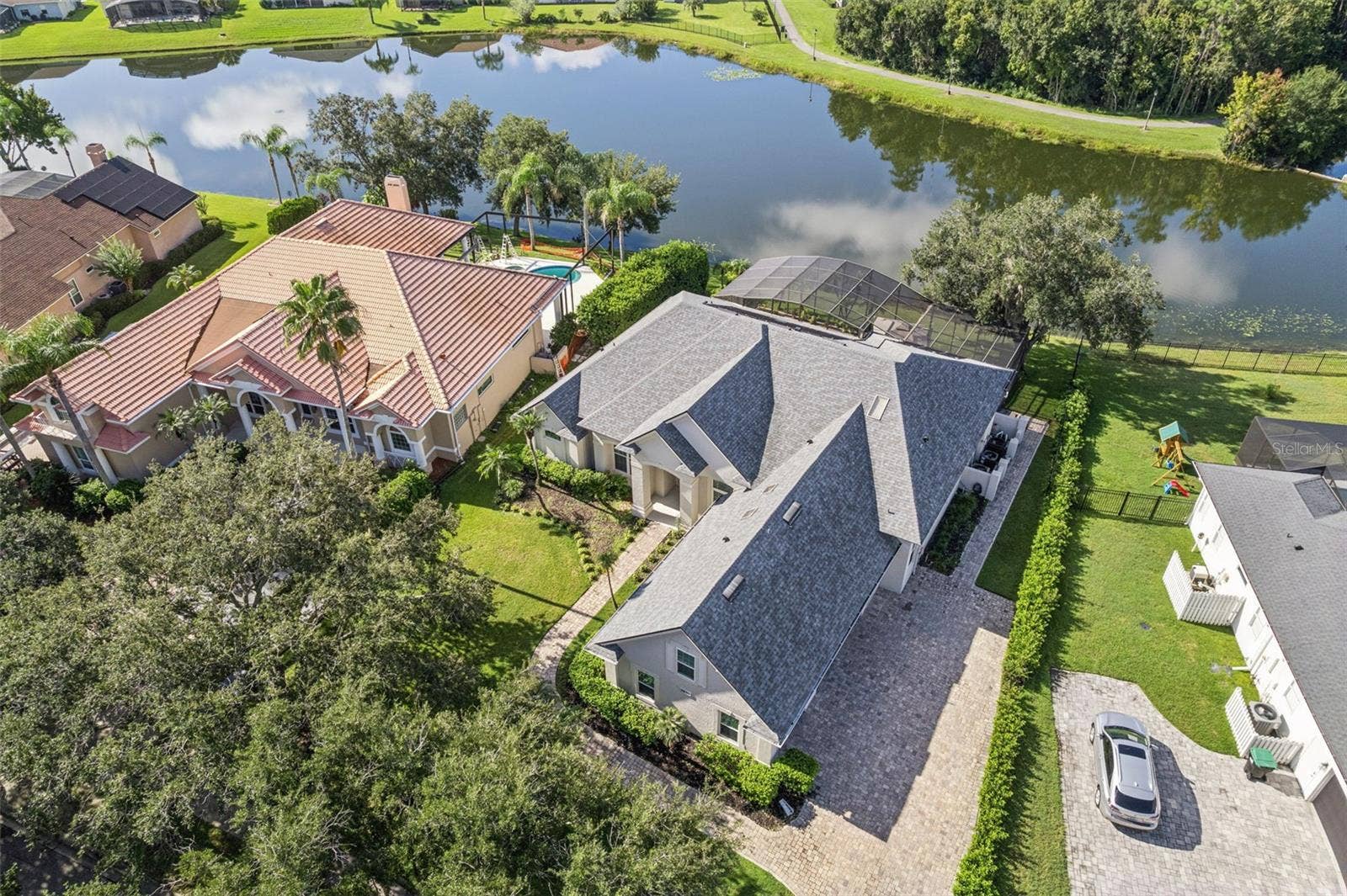 3832 HUNTERS ISLE DRIVE, Orlando, FL 32837 Ariel with beautiful water view - View 5.