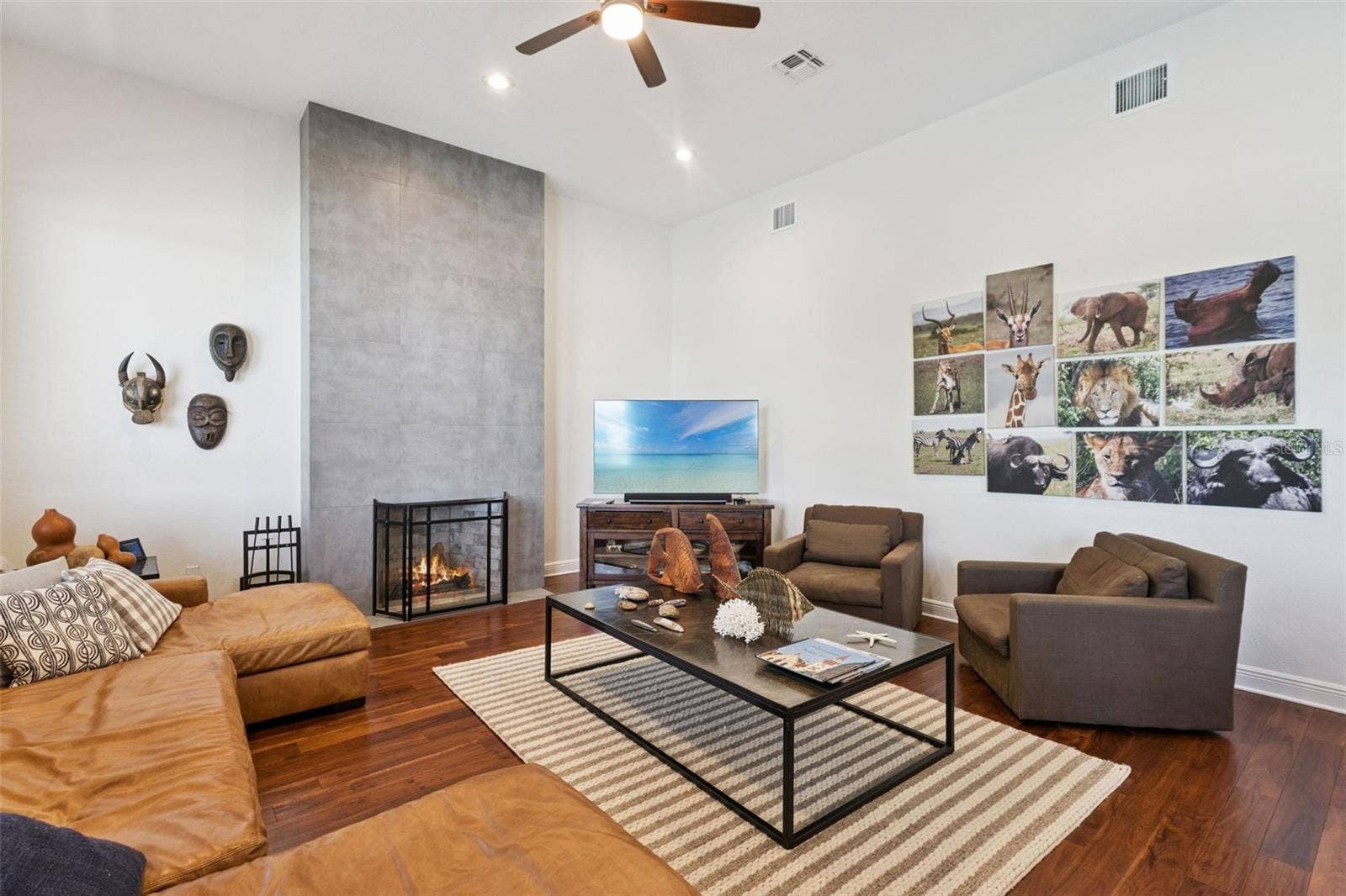 3832 HUNTERS ISLE DRIVE, Orlando, FL 32837 Family room with warming fireplace - view 2.