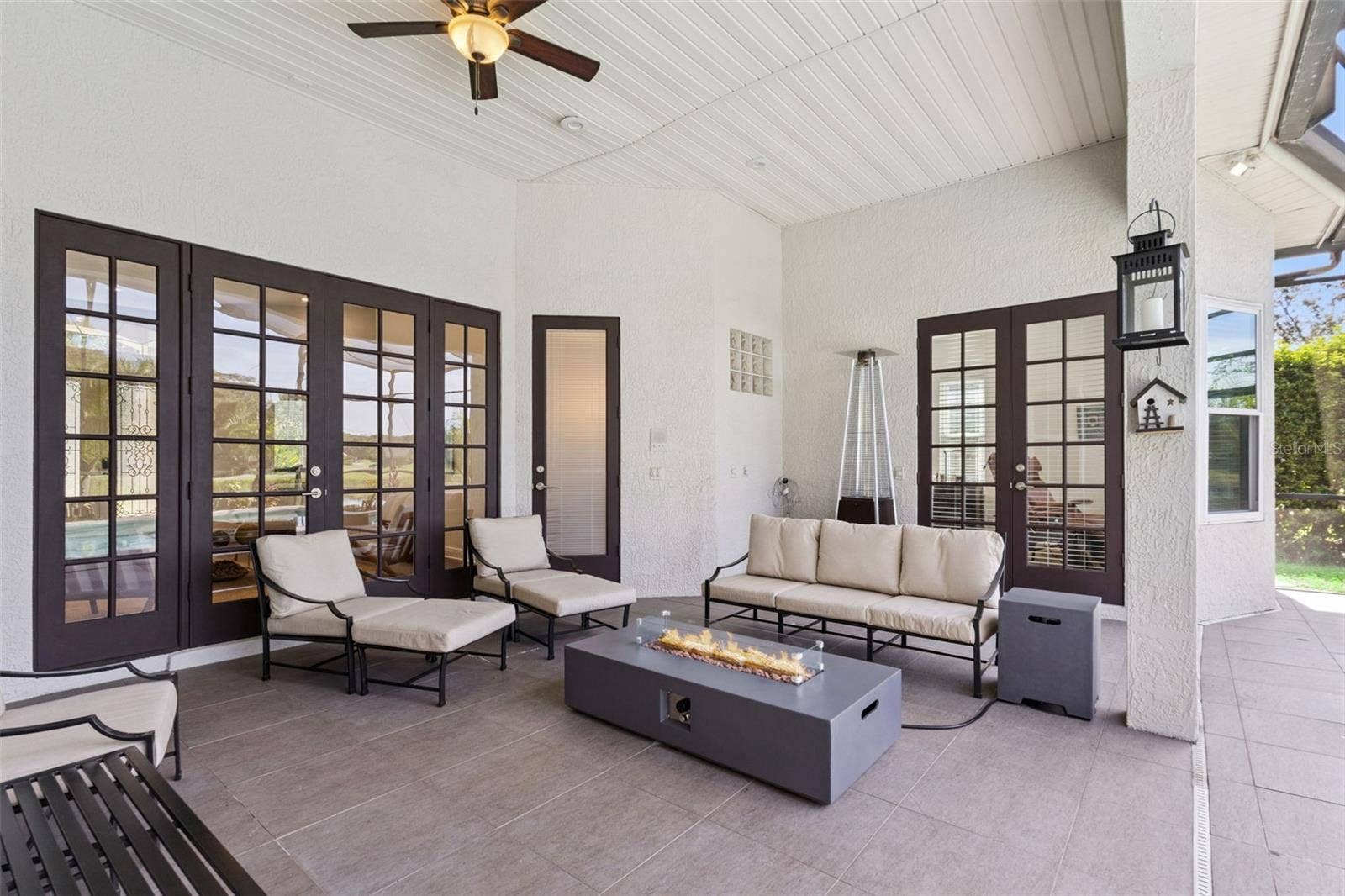 3832 HUNTERS ISLE DRIVE, Orlando, FL 32837 Pool lanai area.