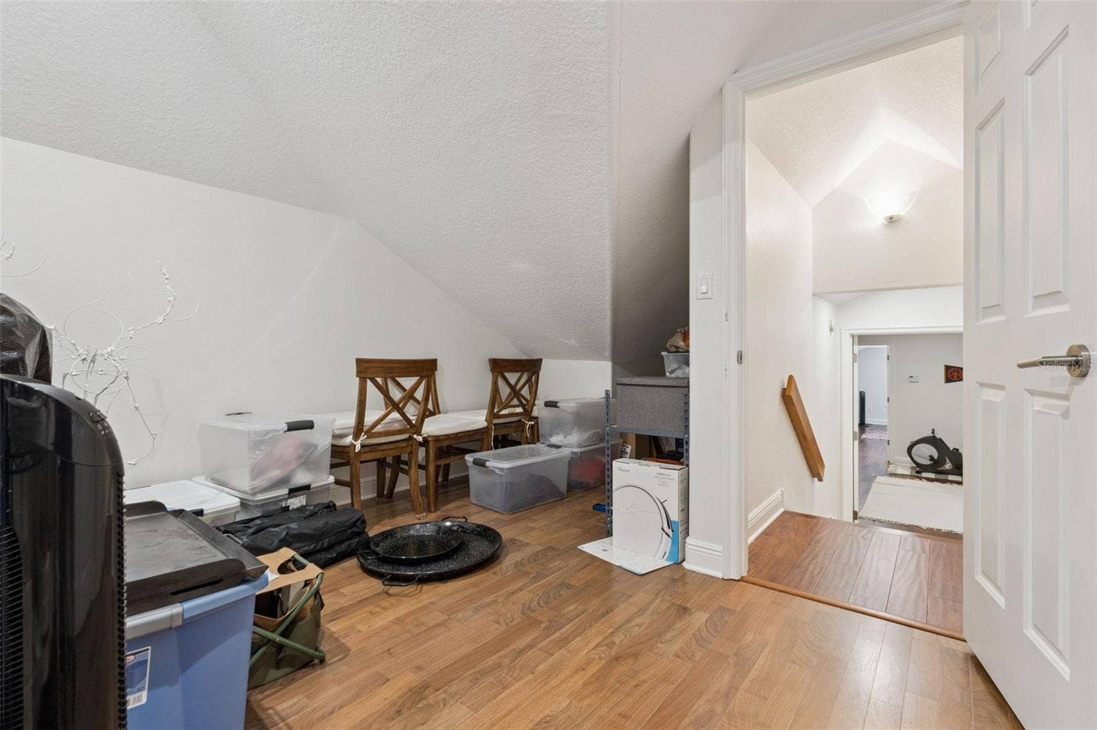 3832 HUNTERS ISLE DRIVE, Orlando, FL 32837 Upstairs room - could be used as storage or small office.