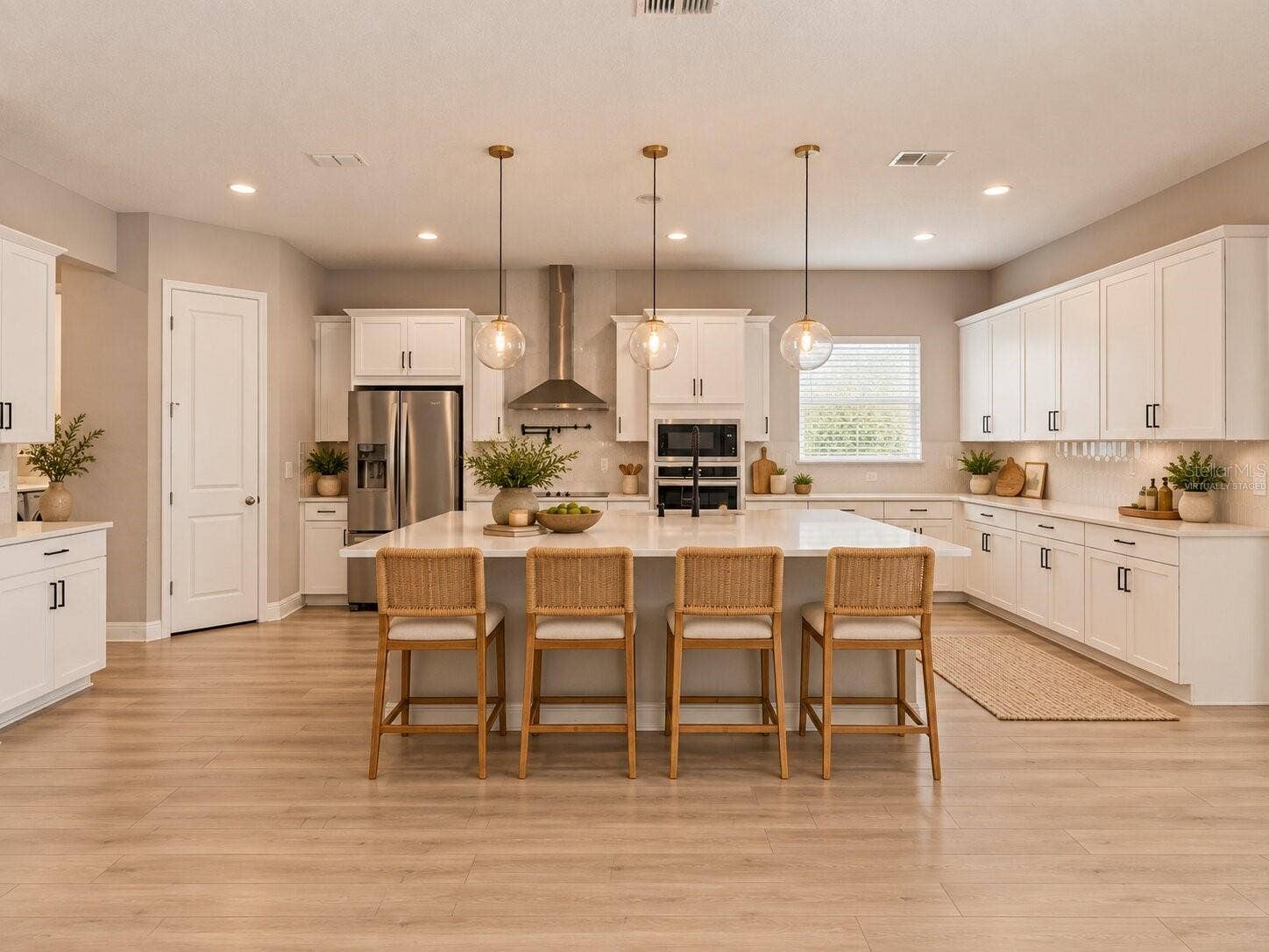 19058 PLANETREE STREET, Orlando, FL 32827 Virtually Staged! Spacious kitchen and dining area designed for entertaining.