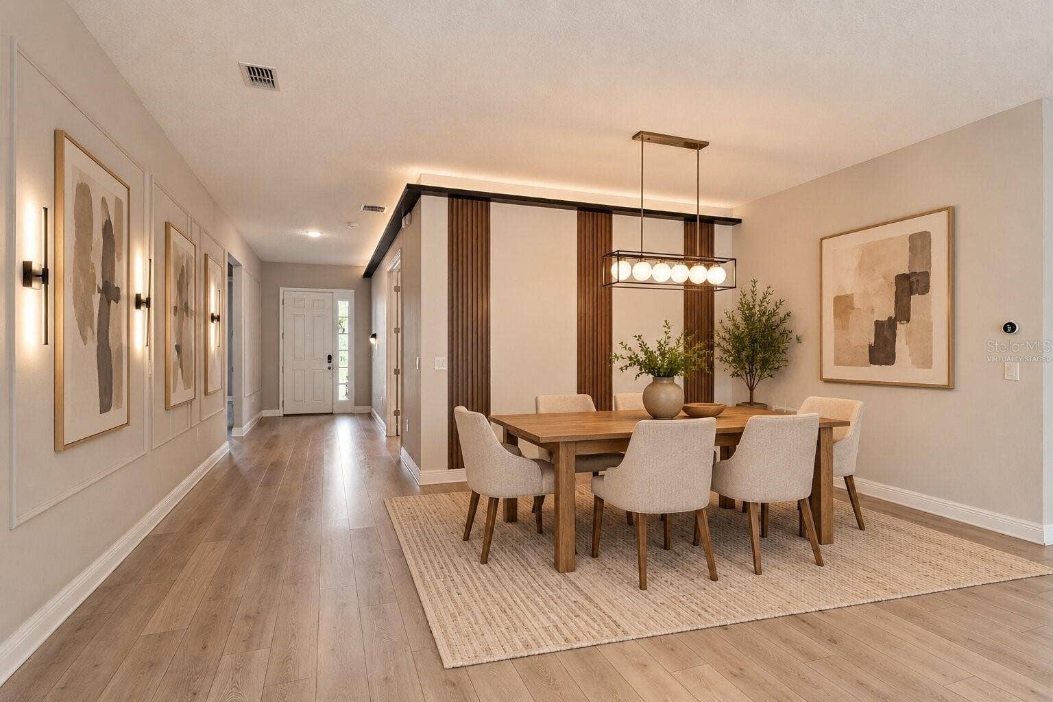 19058 PLANETREE STREET, Orlando, FL 32827 Virtually Staged! Open dining area perfect for entertaining.