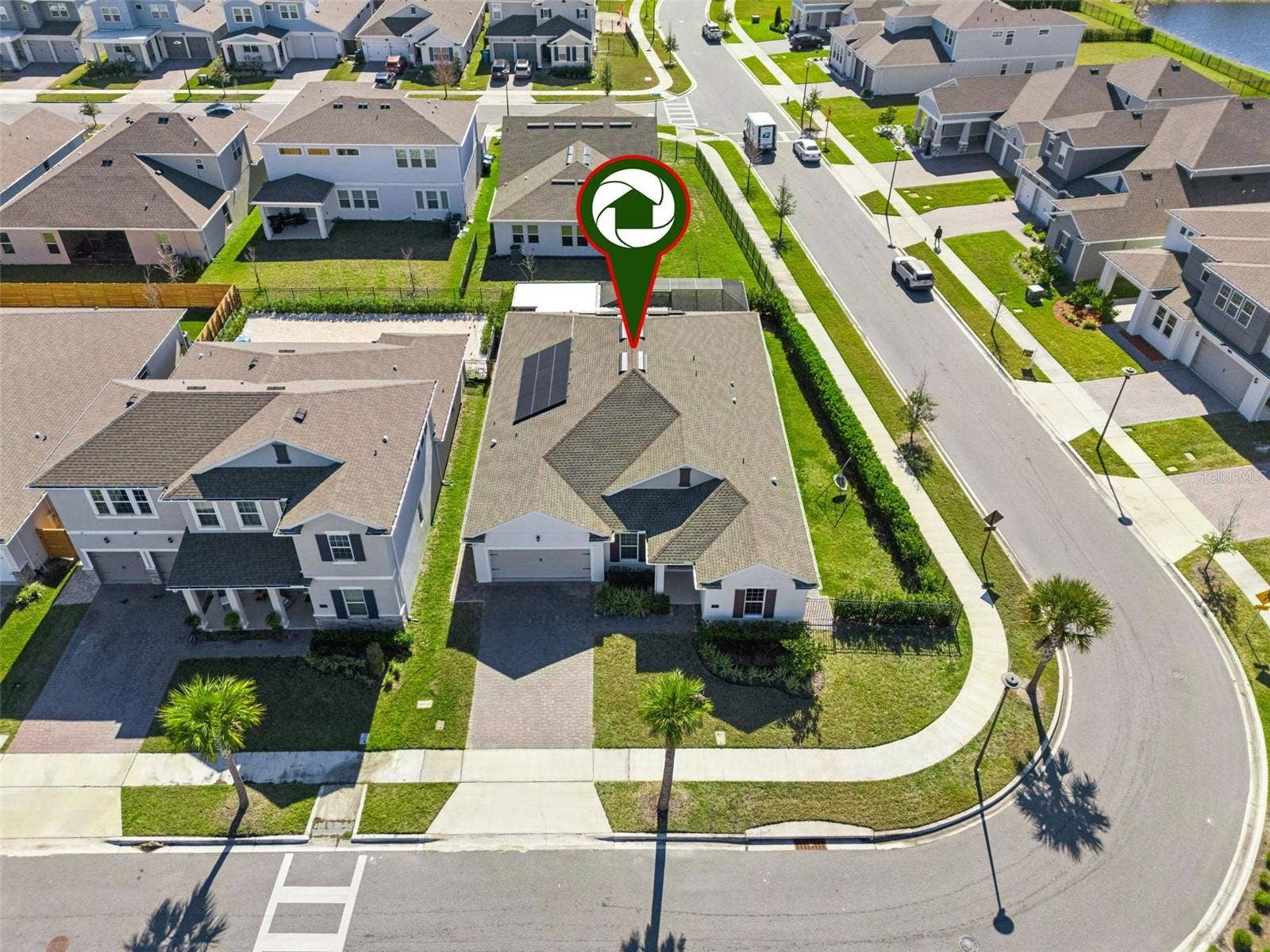 19058 PLANETREE STREET, Orlando, FL 32827 Aerial neighborhood view highlighting the homes location within the community.
