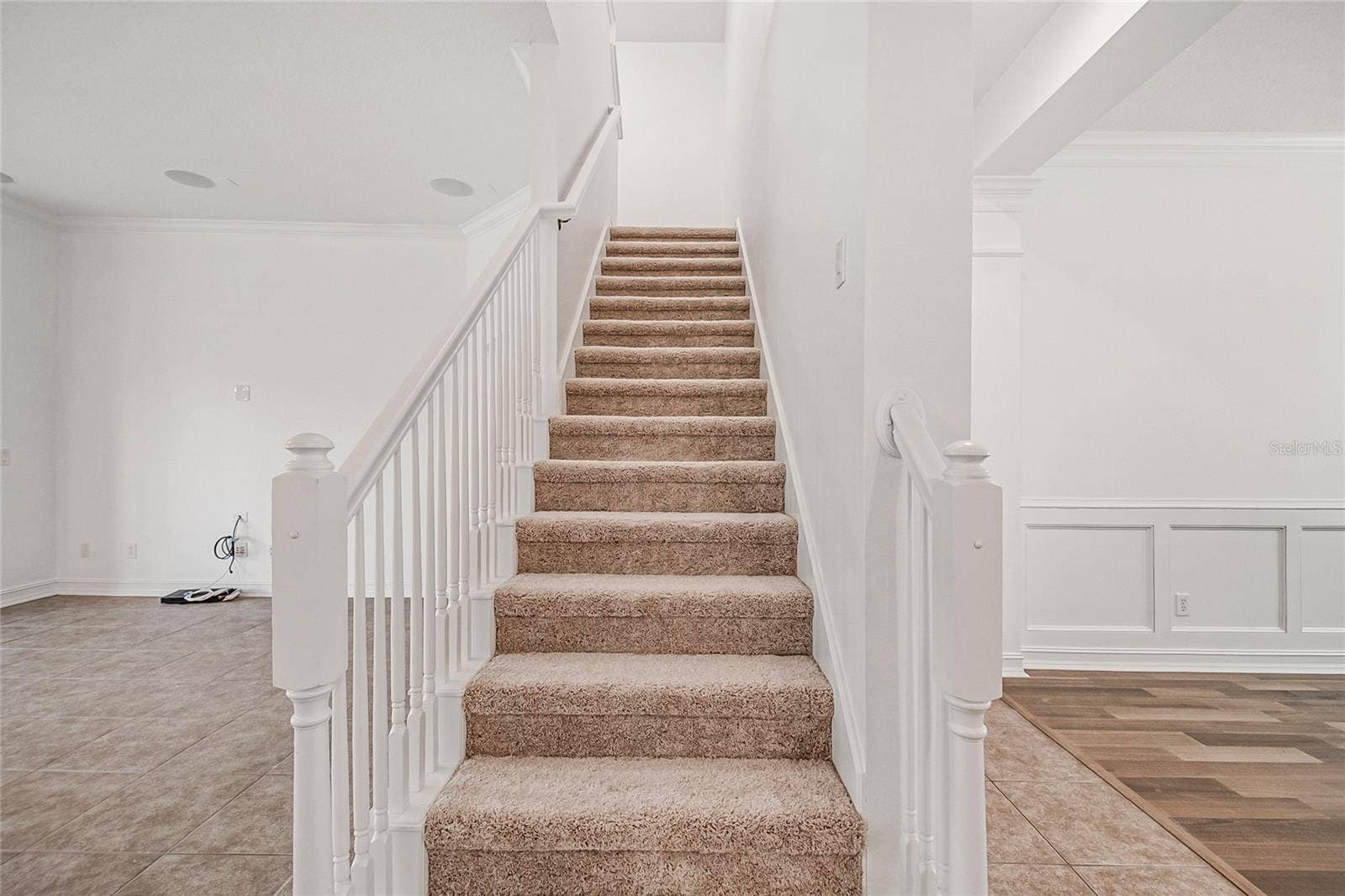 4244 ISLE VISTA AVENUE, Belle Isle, FL 32812 STAIRS TO BONUS ROOM SECOND FLOOR
