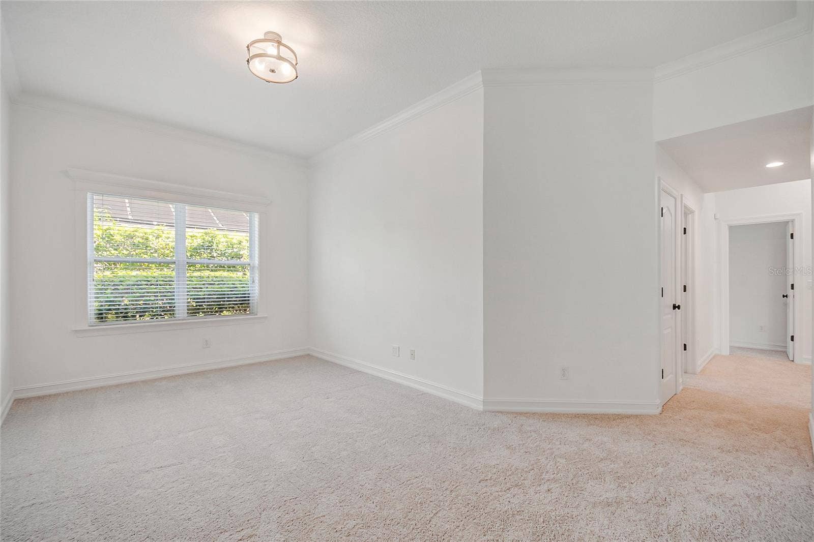 4244 ISLE VISTA AVENUE, Belle Isle, FL 32812 BONUS DEN RETREAT, OFFICE SPACE OR PLAYROOM FOR KIDS DOWSTAIRS