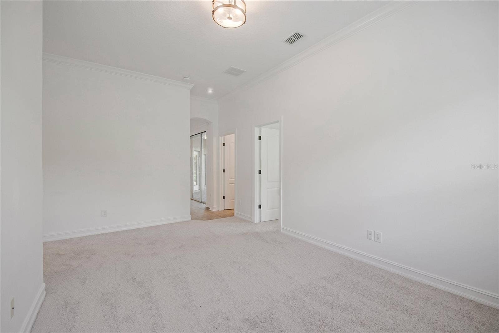 4244 ISLE VISTA AVENUE, Belle Isle, FL 32812 BONUS DEN RETREAT, OFFICE SPACE OR PLAYROOM FOR KIDS DOWSTAIRS