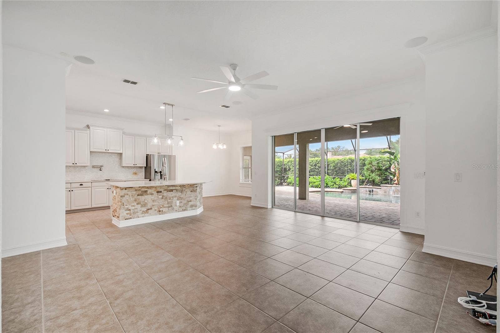 4244 ISLE VISTA AVENUE, Belle Isle, FL 32812 Family room and Kitchen