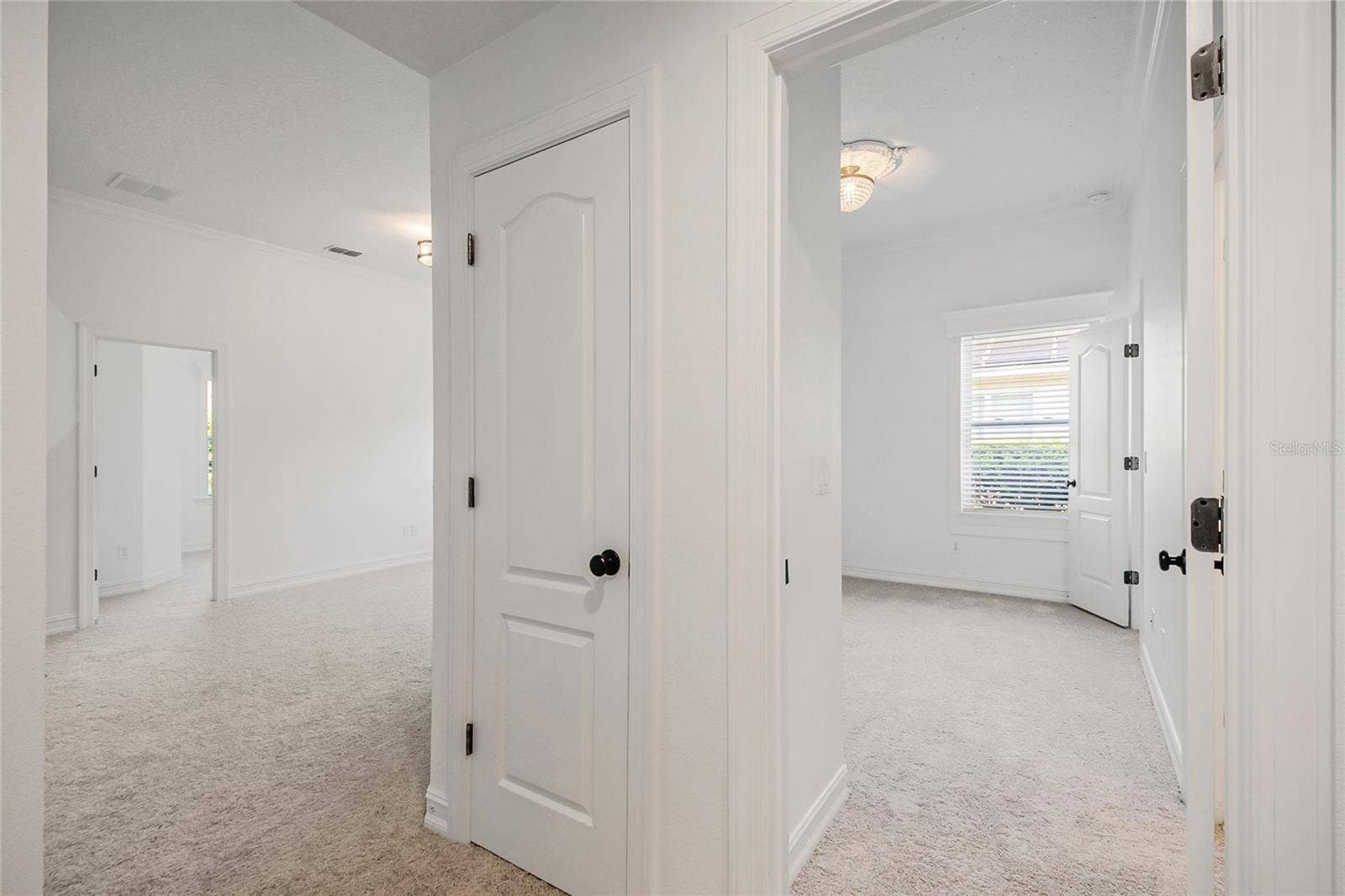 4244 ISLE VISTA AVENUE, Belle Isle, FL 32812 FROM BEDROOMS HALLWAY