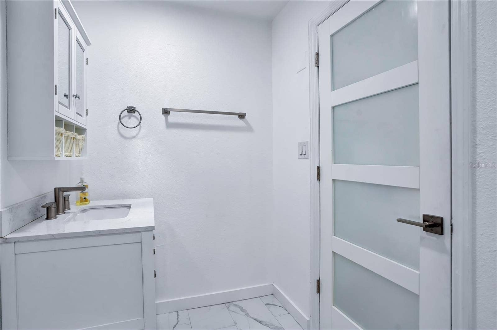 4415 HAYLOCK DRIVE, Orlando, FL 32807 Fully renovated primary bathroom with new door