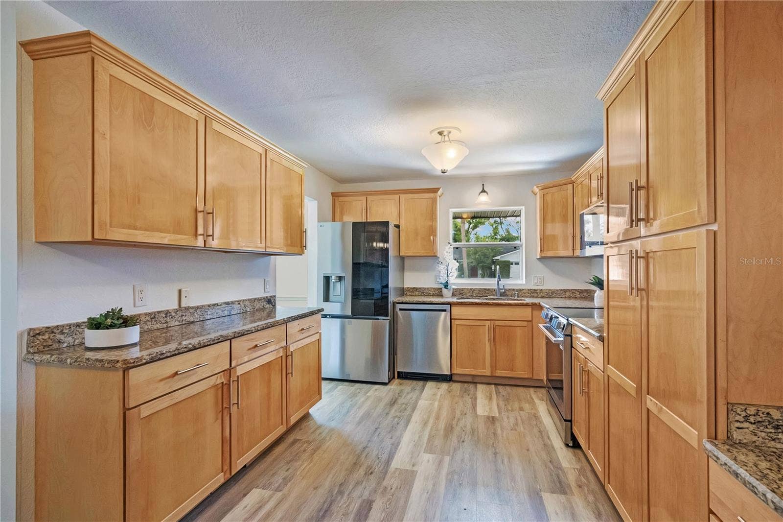 4415 HAYLOCK DRIVE, Orlando, FL 32807 Kitchen, all new appliances, and granite countertops
