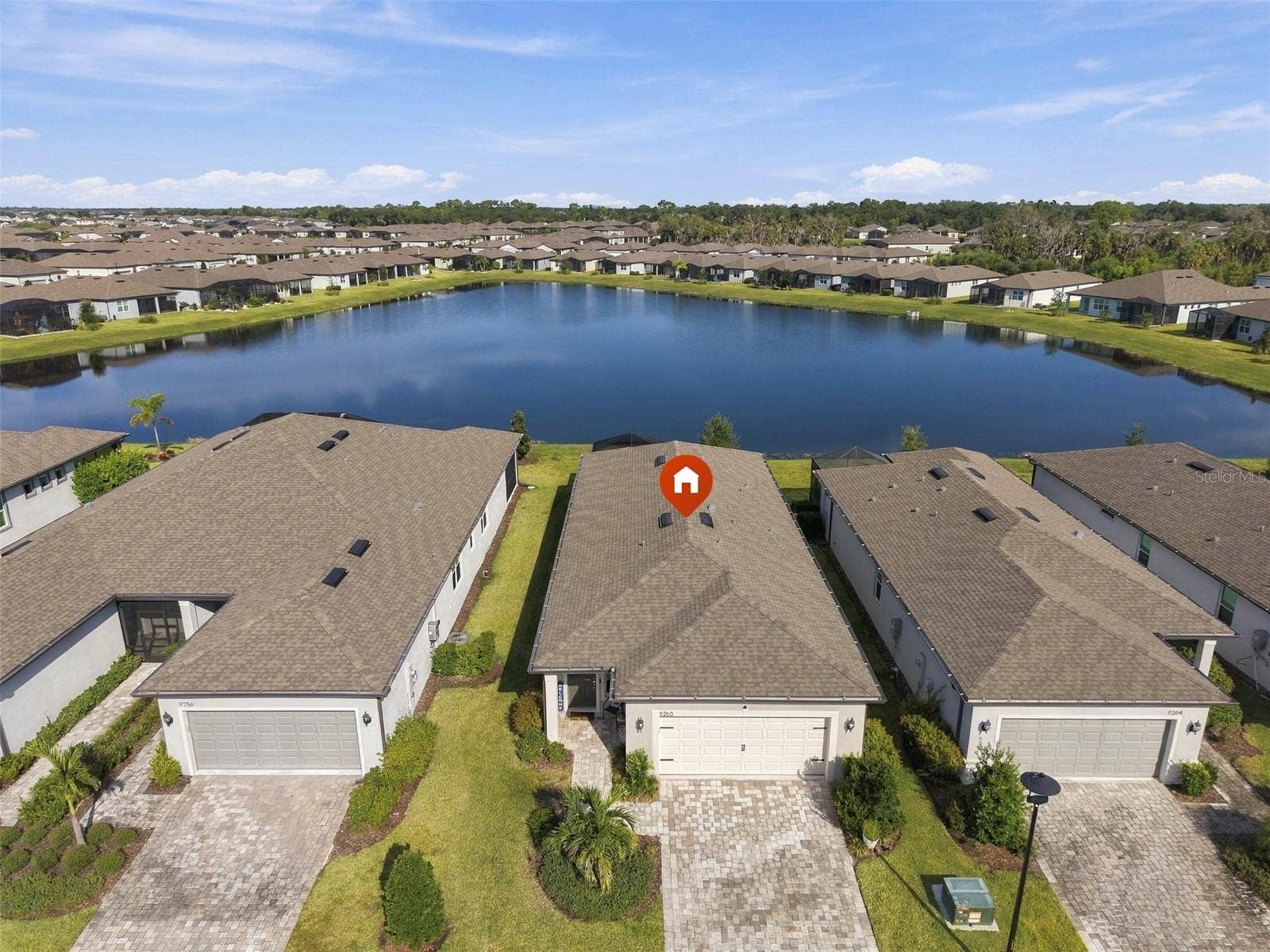 9260 BALLASTER POINTE LOOP, Parrish, FL 34219 Low Maintenance, Gorgeous views and friendly neighbors! Lets go!