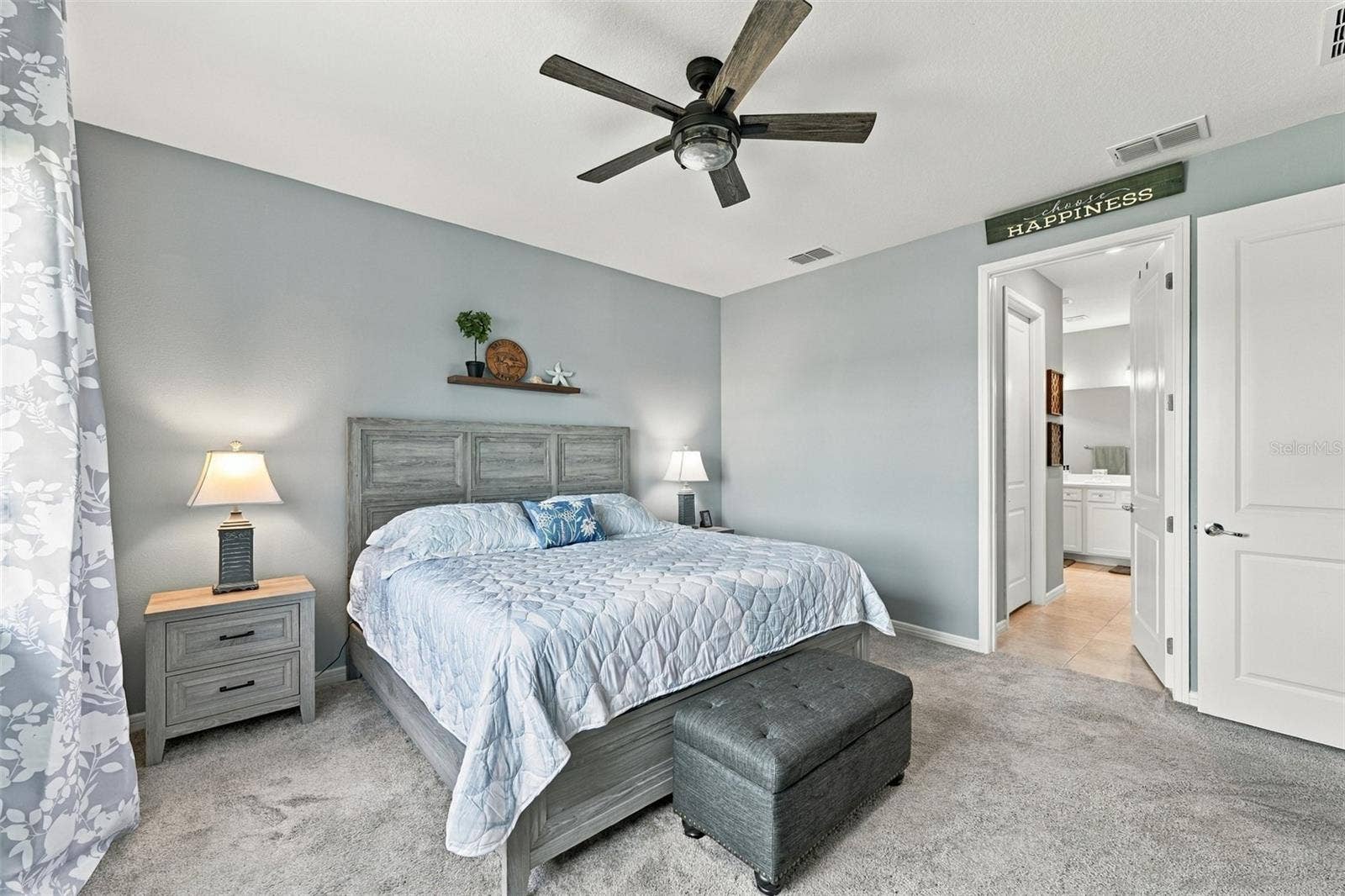 9260 BALLASTER POINTE LOOP, Parrish, FL 34219 Primary Bedroom ensuite including spacious walk in closet.