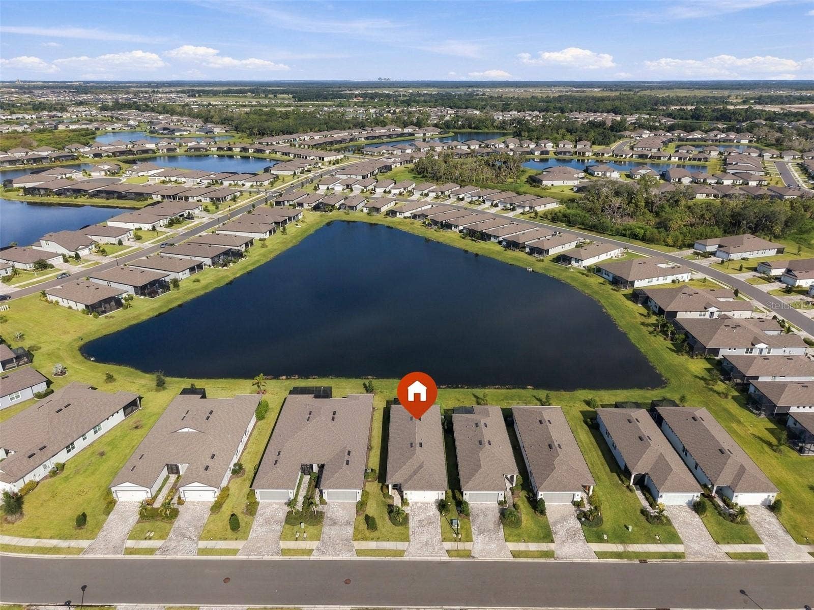 9260 BALLASTER POINTE LOOP, Parrish, FL 34219 Extremely well maintained grounds and pond.