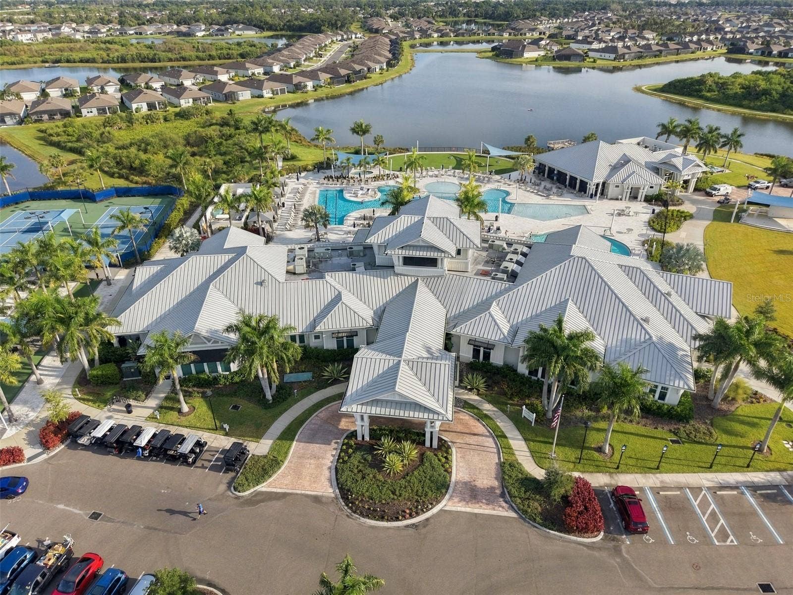 9260 BALLASTER POINTE LOOP, Parrish, FL 34219 The Luxury Club house complete with party rooms, full size gym, exercise studio, gorgeous pool deck with spa, fire pit, pool table and comforable seating througout!