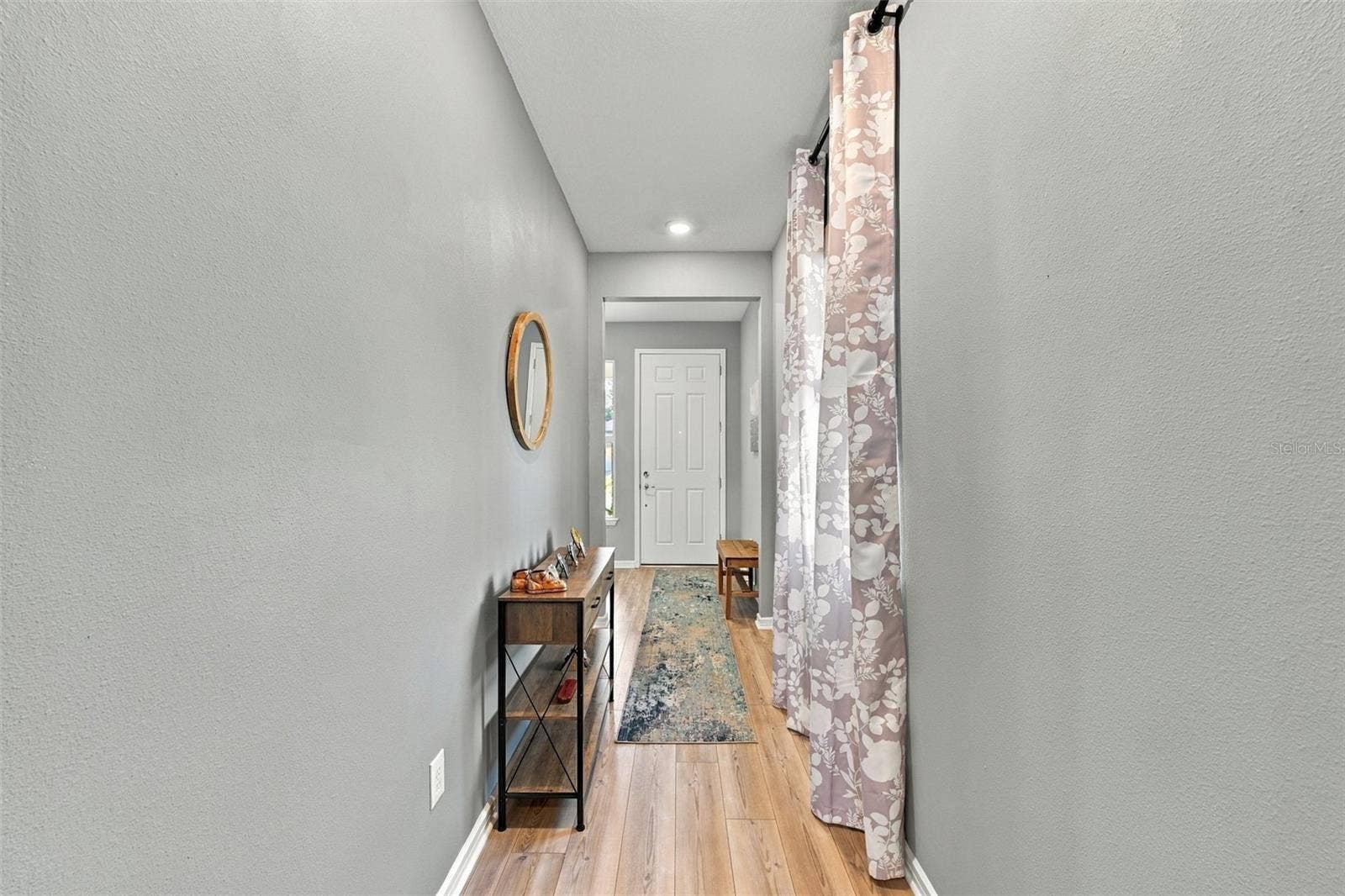 9260 BALLASTER POINTE LOOP, Parrish, FL 34219 Foyer Hallway to Main Living Rooms adds a touch of privacy.