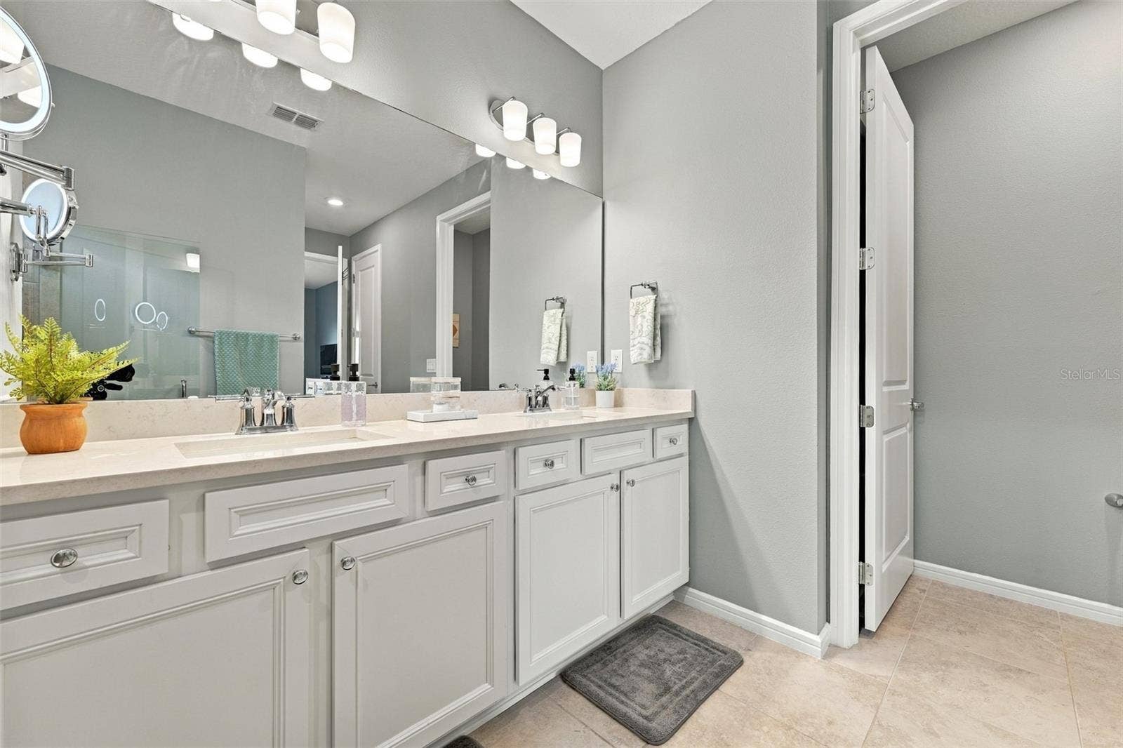 9260 BALLASTER POINTE LOOP, Parrish, FL 34219 Very Comfortable bathroom with seperate toilet room.
