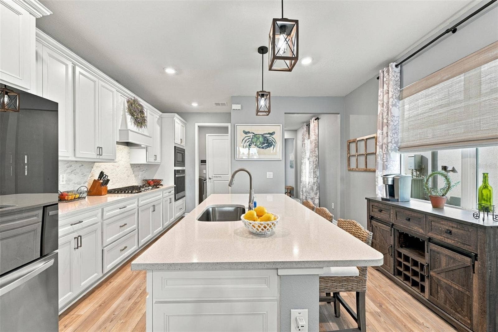 9260 BALLASTER POINTE LOOP, Parrish, FL 34219 You will love to cook here! Perfect Kitchen lay out. Lots of quartz counter tops for easy prep! Storage Drawers are a must!