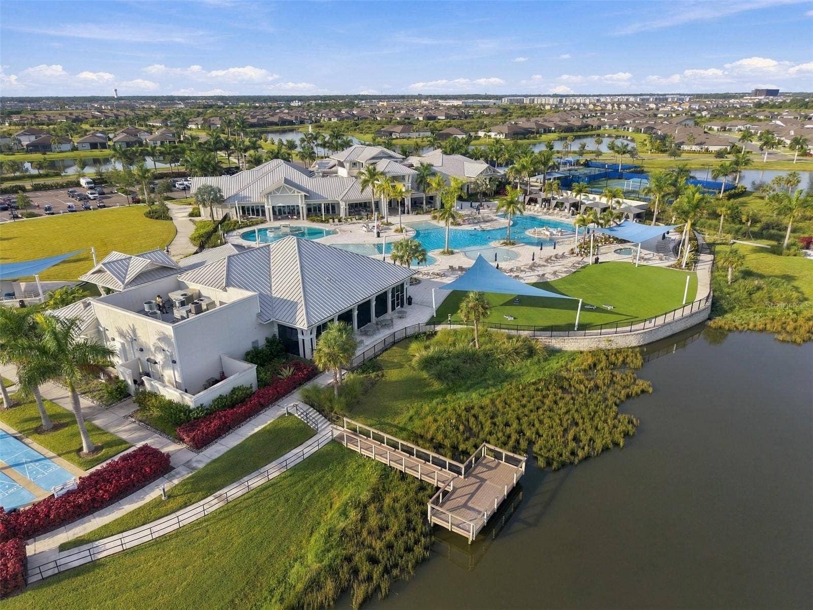 9260 BALLASTER POINTE LOOP, Parrish, FL 34219 "Sailfish" screened Patio, Hot Tub, Game Green and Birdwatching Dock!