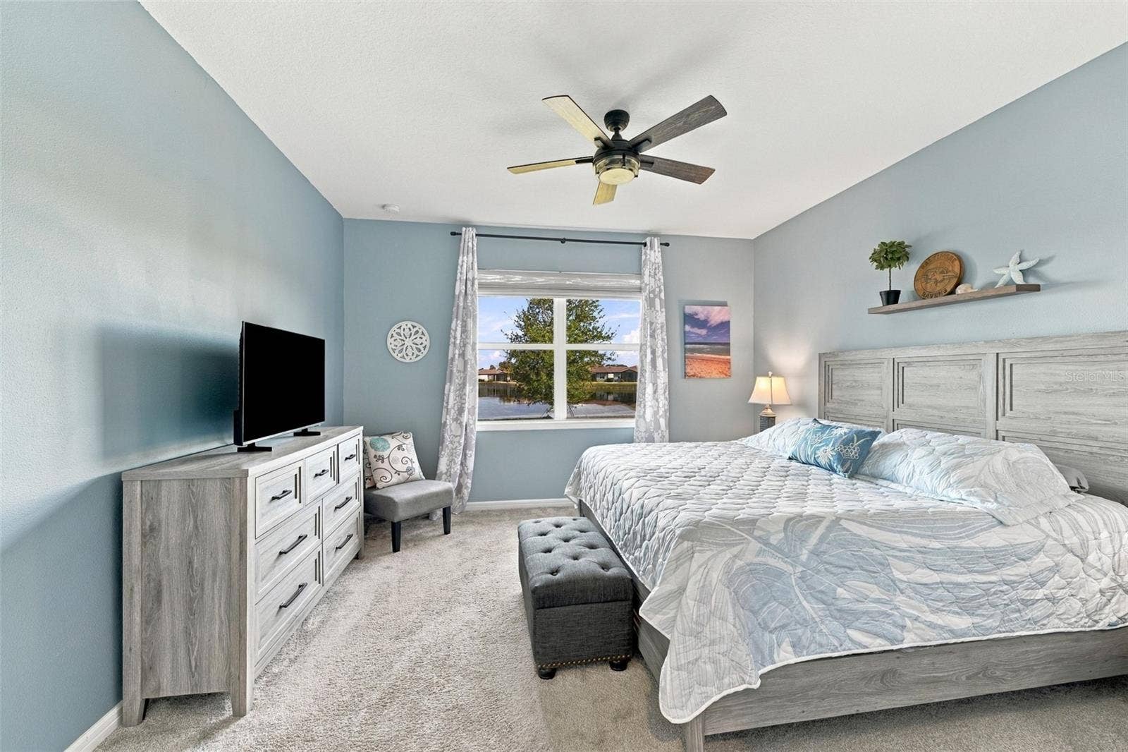 9260 BALLASTER POINTE LOOP, Parrish, FL 34219 Amazing Water Views Enhance this Primary Bedroom.