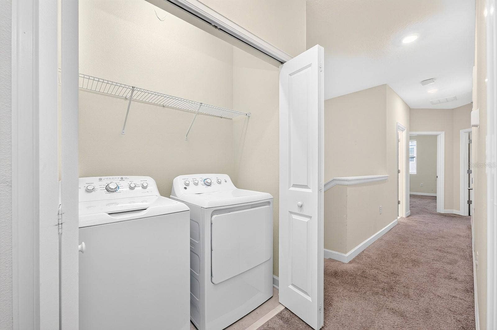 4911 TRIBUTE TRAIL, Kissimmee, FL 34746 laundry closet is upstairs