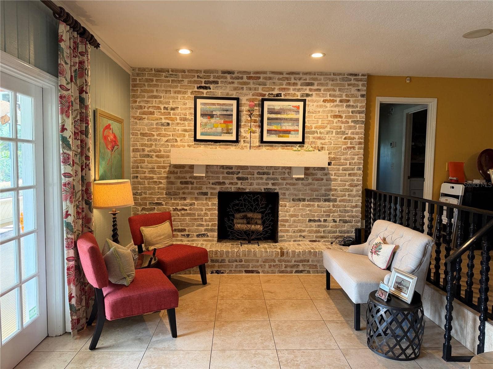 1114 WALD ROAD, Orlando, FL 32806 Brick fireplace in family room
